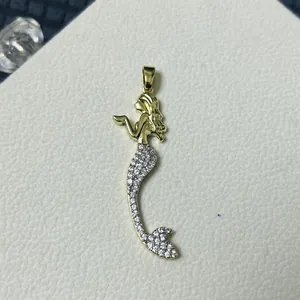 Golden mermaid pendant necklace with micro-paved zircons and heart-shaped accents