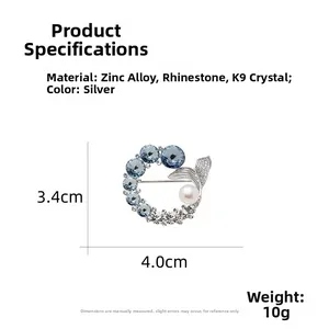 Detailed size specifications of the elegant silver fishtail brooch with blue rhinestones