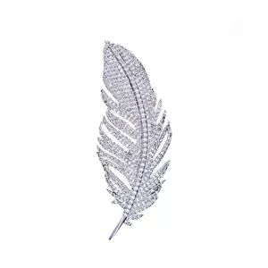 Elegant silver feather brooch with sparkling crystals in a classic design