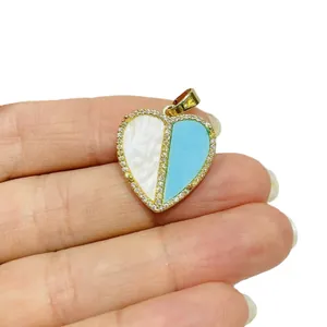 Golden heart pendant with white mother-of-pearl and sky blue enamel pavé details