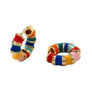 Colorful enamel hoop earrings with wavy gold-tone finish and vibrant rainbow drip oil decor