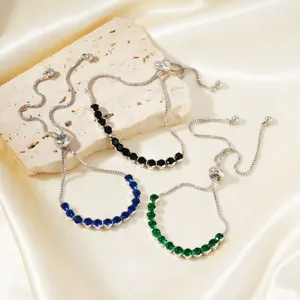Elegantes verstellbares Silberarmband mit schwarzen, blauen und grünen Zirkonsteinen auf Seide