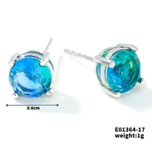 Detail view of sky blue glass stud earring showing 0.6cm diameter and 1g weight
