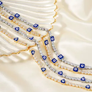 Evil eye necklaces and bracelets with blue zircons and gold and silver finishes
