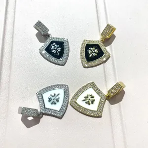 Shield pendant with clover emblem in enamel and zircon, available in gold and silver