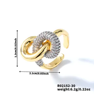 Detail of interlocking two-tone open ring with pavé crystals and dimensions shown