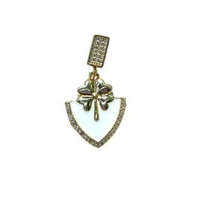 Gold-plated clover shield pendant necklace with white enamel and sparkling zircon accents