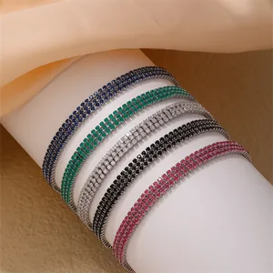 Three-row tennis bracelet with colorful crystals in silver setting on display stand