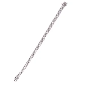 Three-row silver tennis bracelet with white crystals and secure clasp closure
