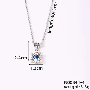 Collar tortuga con ojo turco azul mostrando medidas de 2,4cm de alto y 45cm de largo