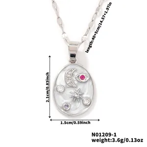 Detailed view of oval celestial pendant with moon star evil eye symbols and gemstones