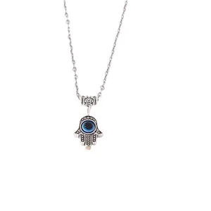 Collar vintage Mano de Fátima con colgante ojo turco azul y finos patrones calados