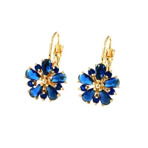Elegant gold-plated floral hoop earrings with pear-cut deep blue zircon stones