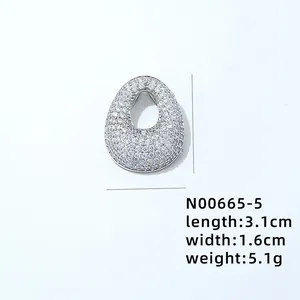 Detailed view of silver pendant with AAA zircon pave settings showing 3.1cm length dimensions