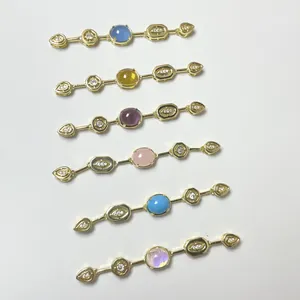 Set of six colorful geometric tassel pendants with gold plating and cubic zirconia accents
