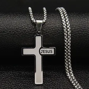Polished stainless steel cross pendant necklace with Jesus engraving on black leather background