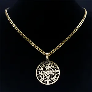 Gold Saint Benedict medal necklace in stainless steel with hollow design on black background