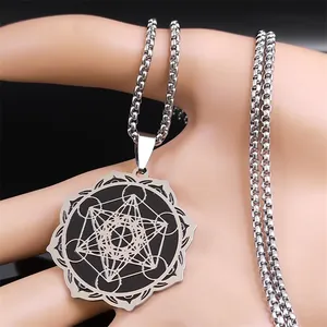 Detailed close-up of the silver Metatron's Cube pendant on a heavy stainless steel chain