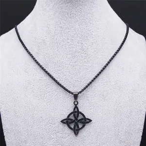 Matte black stainless steel infinity Celtic knot pendant necklace on a white display stand