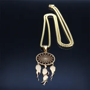 Detailed view of bohemian dreamcatcher pendant with gold feathers on a box chain