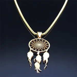 Bohemian gold dreamcatcher necklace with delicate feathers and bead chain on dark background
