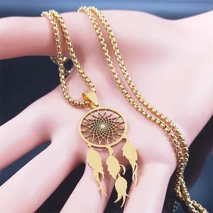 Macro shot of gold dreamcatcher necklace with three leaf charms on a round box chain