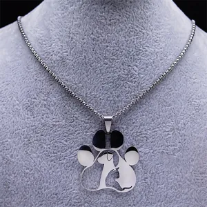 Polished silver pet paw pendant necklace with cat and dog silhouette inside a cutout design