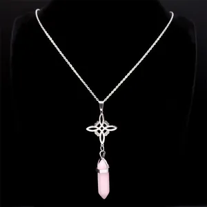 Celtic knot necklace with a light pink hexagonal crystal pendant on a black bust