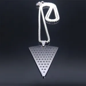 Detailed view of silver stainless steel triangle pendant with engraved Abracadabra text
