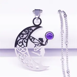 Detail view of crescent moon fairy necklace with hollow pattern and purple crystal bead