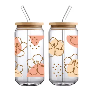 2er-Set Glasbecher in Dosenform mit Boho-Blumendruck, Bambusdeckeln und Glasstrohhalmen