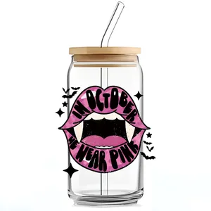 Detail of 16oz glass cup with bamboo lid and pink Halloween vampire lips print