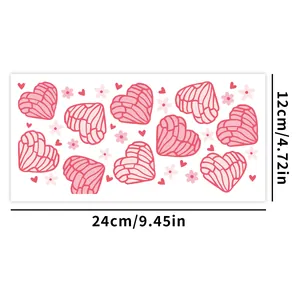 Detailed UV transfer sticker for 16oz glass featuring pink heart and flower motifs