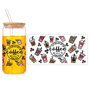 Detail of coffee theme UV transfer sticker on 16oz glass can with bamboo lid