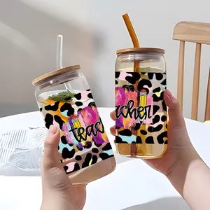 Detail of teacher-themed 16oz glass can wrap with leopard print and vibrant oil painting strokes