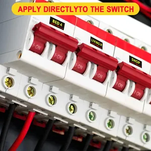 Macro view of self-adhesive colored breaker box labels applied on circuit switches