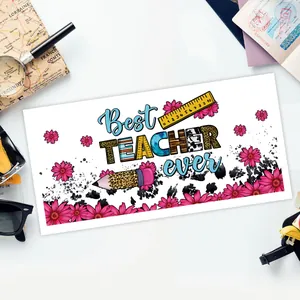 Detail of UV DTF transfer sticker with 'Best Teacher Ever' text and floral elements
