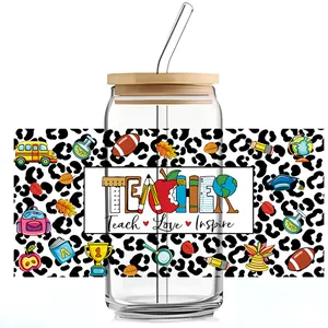 Detail of 16oz glass tumbler with bamboo lid and teacher-themed leopard print wrap