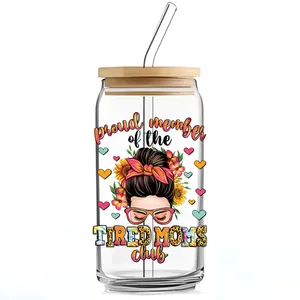 Detail of 16oz glass can with Tired Moms Club UV DTF print and bamboo lid