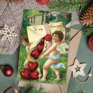 Detail of vintage Valentine postcard with cupids and hearts on festive green knit texture
