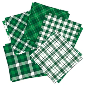 Detailed view of layered green and white gingham decorative paper for St. Patrick's scrapbooking