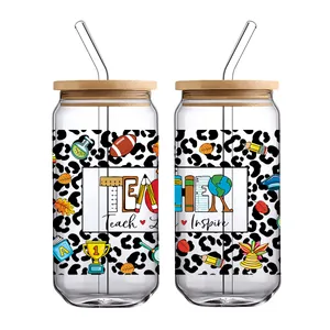 Close-up of UV DTF teacher theme leopard print transfer stickers on 16oz glass cups