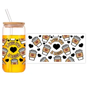 Detail of 16oz glass can with bamboo lid and I Love You A Latte coffee heart decal