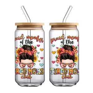 Set of two 16oz can-shaped glass cups with bamboo lids and Tired Moms Club UV DTF prints