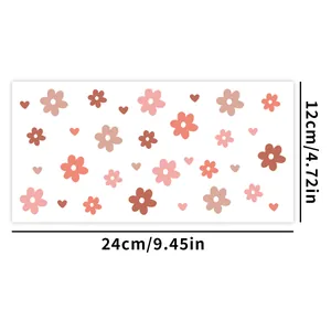 Gedetailleerde afmetingen van 24cm x 12cm UV DTF transfersticker met roze bloemen en harten
