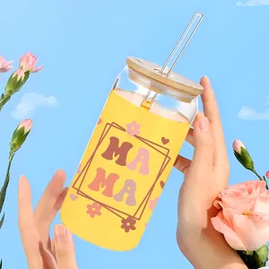 Detail of UV transfer sticker on 16oz glass can with MAMA letters and floral patterns