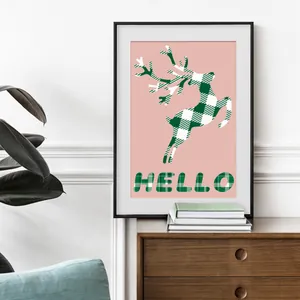 Modern framed wall art featuring a plaid reindeer and HELLO text for home decoration