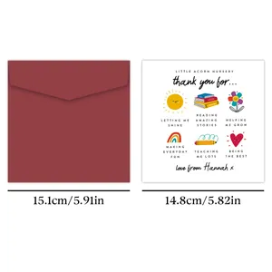 Detailed view of hand-drawn thank you card with rainbow and sun next to red envelope