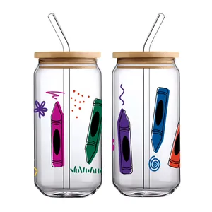 Detail of 16oz glass cans with bamboo lids and colorful crayon pattern decals