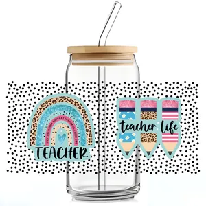 Detail of UV DTF transfer sticker on 16oz glass can with bamboo lid and straw